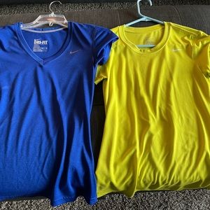 Two Nike running shirts size XS. Worn only a couple of times.